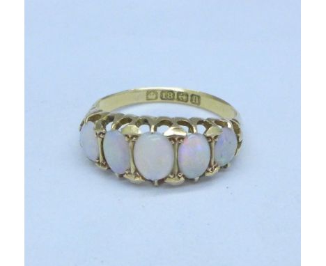 An antique 18ct gold and five stone opal ring, dated Birmingham 1912, size L, 2.7g