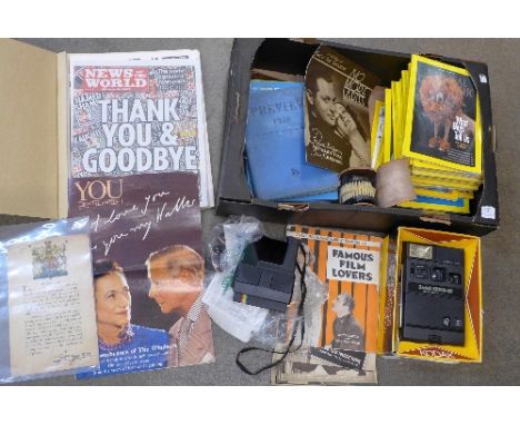 A Kodak EK160-EF Instant Camera and a Polaroid 600 Land camera, a part album of cigarette cards, ephemera including film rela
