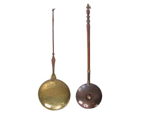 An early 18th century brass and iron warming pan, EnglishThe domed brass pan lid with a punched-decorated six-pointed star, t