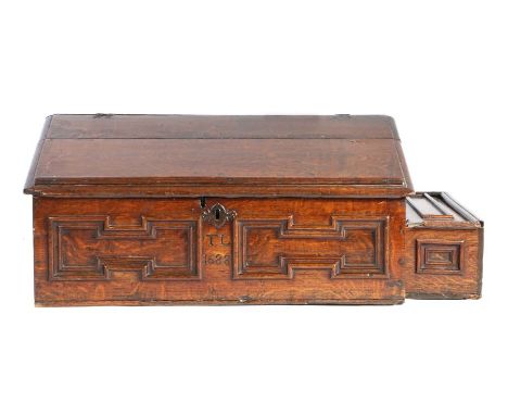 A James II/Mary II boarded oak desk box, with external till, dated 1688Having a sloping and ovolo-moulded fall, mitre-moulded