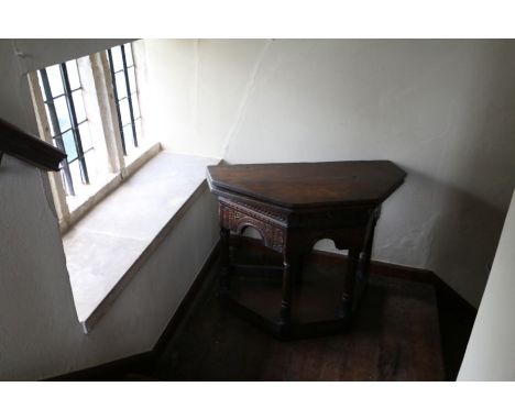 A James I oak fold-over table, of credence-type, Salisbury, circa 1610Having an octagonal fold-over top, when open supported 