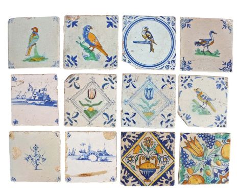 A collection of 18th Century Delft tiles, to include five with polychrome decorated tiles with birds, a blue and white exampl