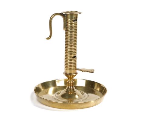 A rare and good early 18th century brass ejector chamberstick, NurembergHaving a ribbed pillar stem, with three adjustable ca