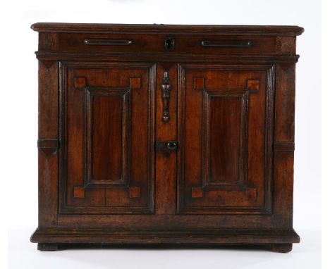 A 17th Century oak and fruitwood ‘box-top’ chest, circa 1670Of narrow proportions, having an end-cleated and ovolo-moulded hi