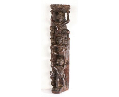 An exceedingly rare and highly unusual mid-16th century walnut pilaster or term, circa 1550Designed as three naked putti, a s