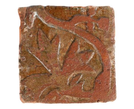 A 14th century floor tile, Bawsey, NorfolkThe design part of a vine trail, brown glaze, 10.5cm x 10.5cmProvenance: St. Benedi
