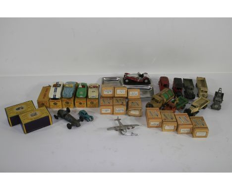 Four boxed Dinky toys,numbers 107, 109, 110 and 133, together with an empty Dinky box for 108 MG Midget Sports; 8 unboxed Din