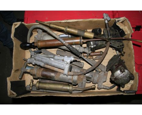Assorted greasers,oilers and lubrication tools, including Enots Autoram, Tecalemit oil cleaners and others, various condition