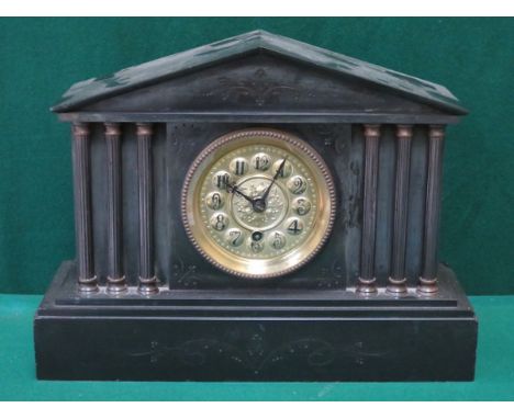 DECORATIVE BLACK SLATE COLUMN FORM MANTEL CLOCK WITH GILT METAL DIAL 