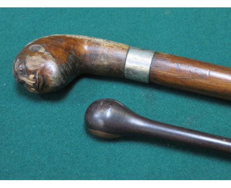 INTERESTING CARVED WALKING STICK WITH SILVER COLOURED MOUNT, INSCRIBED 'HMS NAIAD 1797-1897'.  ALSO ANOTHER WALKING STICK 