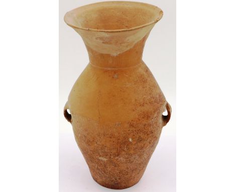 A Neolithic period terracotta vessel, having two ring handles and flared neck, the body tapering in baluster form, undecorate
