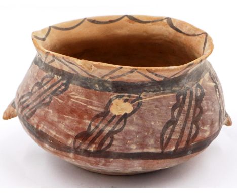 A Neolithic period painted terracotta twin handled pot, decorated with geometric designs, painted mark to the base, H: 8 cm, 