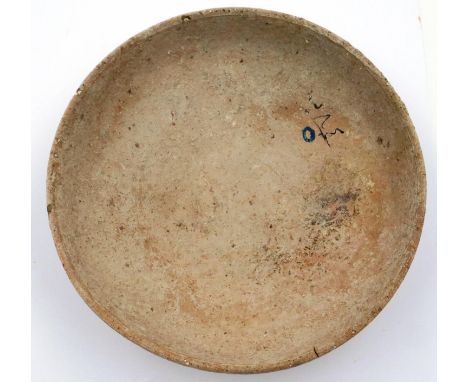 A Han Dynasty shallow bowl, terracotta and tapering to a circular foot, D: 16 cm. P&P Group 3 (£25+VAT for the first lot and 