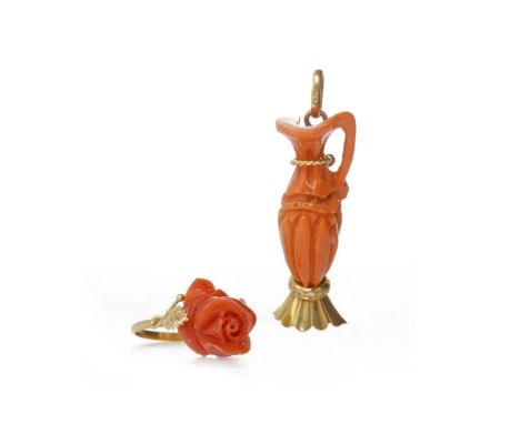 EIGHTEEN CARAT GOLD CORAL PENDANTin the form of a jug with round brilliant cut diamonds set to the base, the diamonds totalli