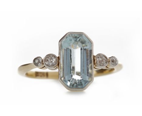 EDWARDIAN AQUAMARINE AND DIAMOND DRESS RINGset with a central hexagonal step cut aquamarine 9.5mm long and flanked by four gr