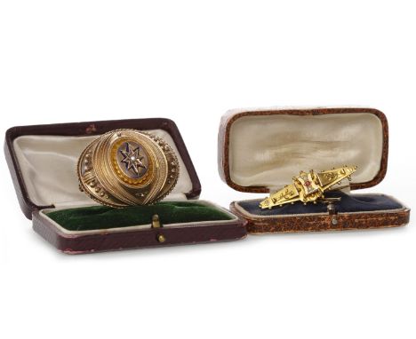 TWO VICTORIAN BROOCHESone of oval form, with central oval section with an enamelled star motif with a single pearl, with area