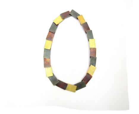 A Modernist silver and gold Vermeil textured tile necklace. Marked 925 along with designers mark 
