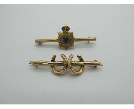 Army Service Corps Bar Brocoh, (bar stamped "9ct" / steel pin); together with a double horseshoe bar brooch. (2)