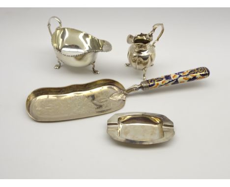 Georgian design silver cream jug Birmingham 1930, silver sauce boat Sheffield 1922, silver ashtray and a plated crumb scoop w