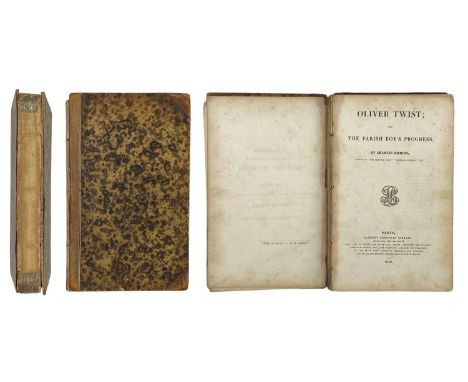 DICKENS, Charles Oliver Twist  Brown leather with brown marbled boards, spine is missing, leather is worn at corners with boa