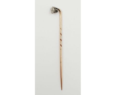 A yellow metal stick pin with small diamond head. Weighs 0.73g and is 5cm. 