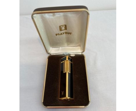 Vintage Playboy lighter in gold tone and black enamel having bunny logo and original case. Purchased in 1972 from the Playboy