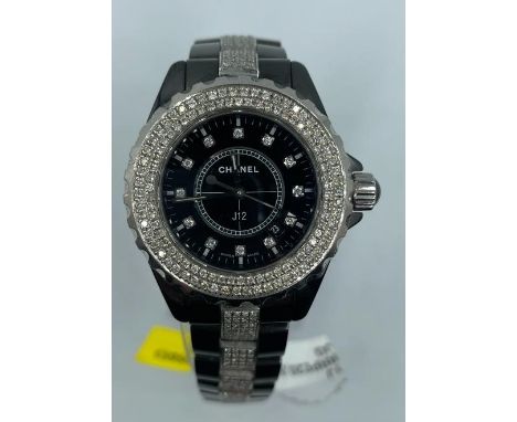 Chanel ceramic quart watch, black face with full diamond bezel and strap 