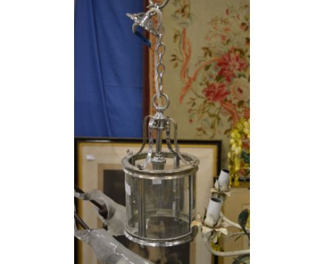 A good small chrome circular hall lantern.