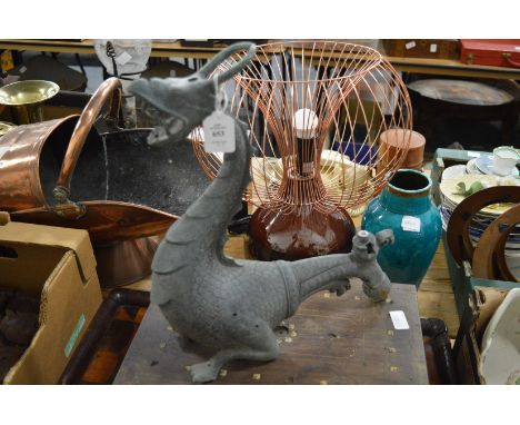 A cast metal model of a dragon, an Eastern hardwood box and an inlaid tray.