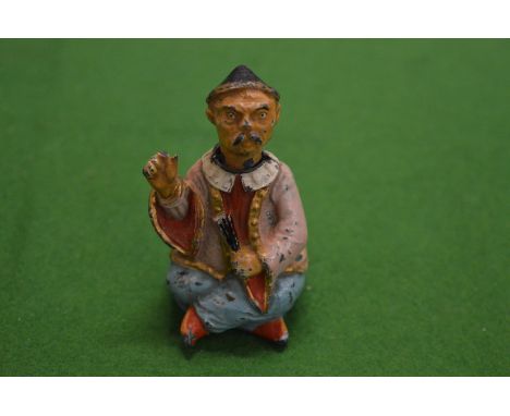 Small painted model of a nodding Chinaman.