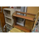 A painted bookcase and pine shelves.