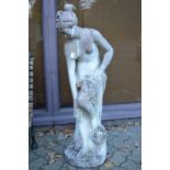A reconstituted stone garden statue modelled as the bather.