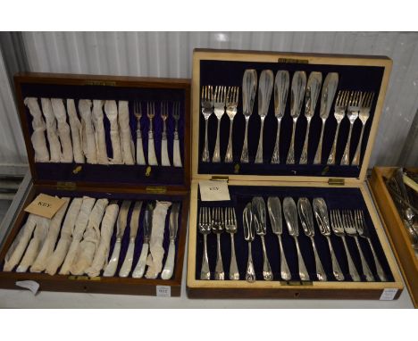 A cased set of mother of pearl handled dessert knives and forks together with a cased set of fish knives and forks.