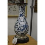 A Chinese blue and white baluster shaped vase lamp (faults).