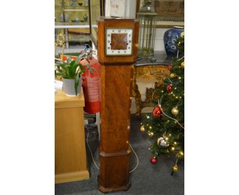 A 1940's walnut grandmother clock.