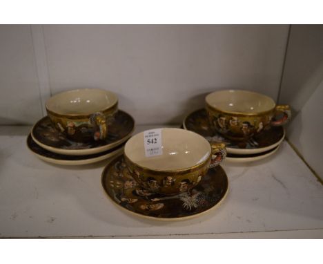 Japanese satsuma cups and saucers.