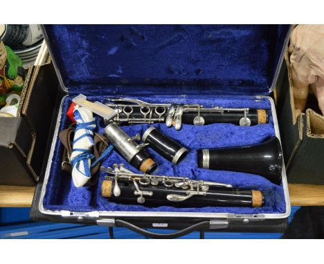 A cased clarinet etc.