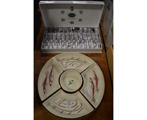 A Poole pottery fish decorated o'dourves set together with a Portmeirion Botanic Garden box set of cakes knives and coffee sp