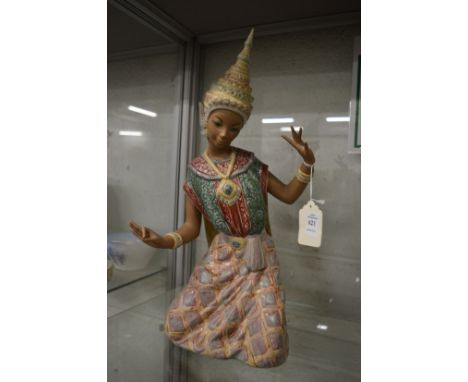 A large Lladro pottery model of an Eastern dancer.