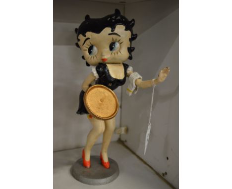 A painted cast iron model of Betty Boop.