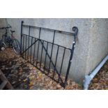 A large wrought iron gate.