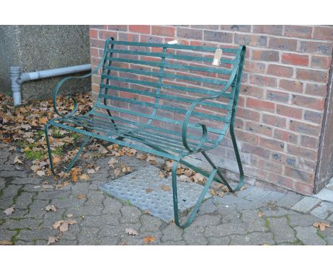 A Regency style wrought iron garden bench.