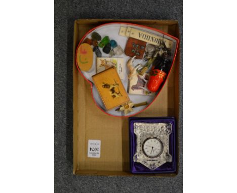 A small glass clock and miscellaneous collectables.