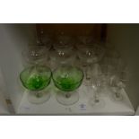 A set of nine etched champagne glasses etc.