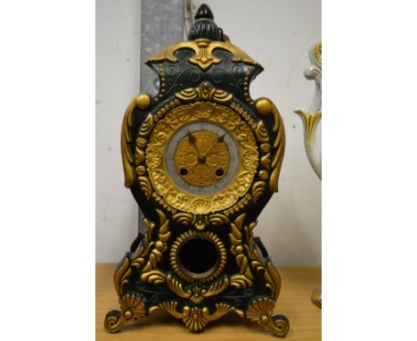 A decorative mantel clock.