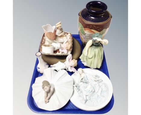 A tray of assorted ceramics, Nao figure of a ballerina, embossed wall plaque, Royal Doulton figure Buttercup, cherub figure, 