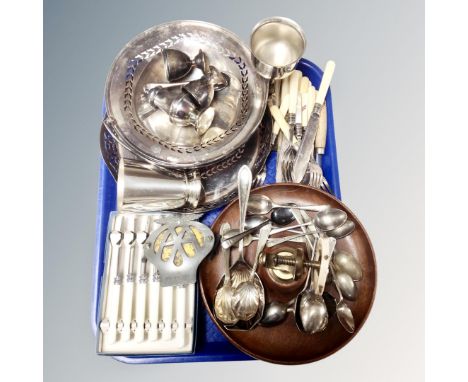 A tray of ship's wheel nut cracker bowl, assorted plated wares, cutlery, vintage AA badge