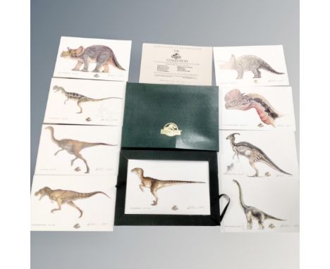 A Jurassic Park nine piece colour lithographic print set, signed by Crash McCreery and Stan Winston in slip cover 