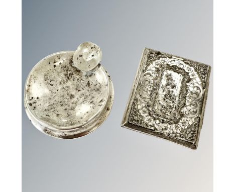 A silver ashtray with weighted base and a continental silver cigarette case stamped '800'. (2) CONDITION REPORT: Cigarette ca