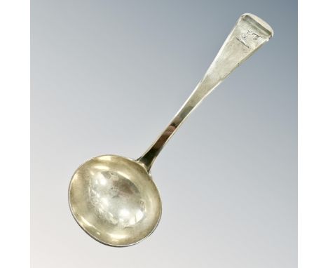 A Georgian silver ladle, London marks, length 17.5cm.  CONDITION REPORT: 83.7g. 